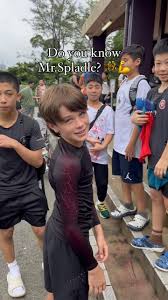 Logan with wrestling teammates and supporters