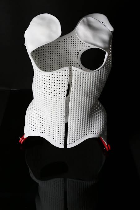 Modern scoliosis braces are lightweight, highly ventilated, and fully customized using 3D technology., AI generated