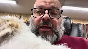 Man with large head grows fur