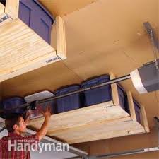Build a simple rack to suspend a ladder from your garage ceiling. Easy Garage Storage Solutions Diy Family Handyman