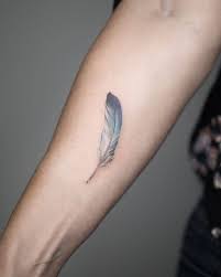 Tiny Tattoo Ideas For People Who Are Afraid To Commit Small Feather Tattoo Feather Tattoo Feather Tattoos