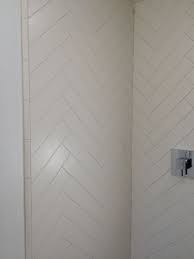 Herringbone 4 X 12 Matte White Tile In The Shower Shower Tile Designs White Herringbone Tile Herringbone Tile Bathroom