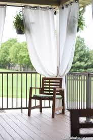 The easiest way to install an outdoor curtain is with a tension rod placed inside the supports of a screened porch or pergola wall. Diy Patio Curtain Tie Backs For 5 00 Rustic Nautical