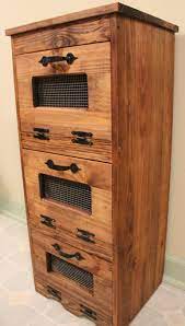 Plant your potatoes three to six inches apart at various depths in the containers. Vegetable Bin Potato Storage Rustic Cupboard Primitive Kitchen Wooden Shelf Onion Potatoes Farmhouse Potato Storage Wooden Kitchen Storage Diy Kitchen Storage