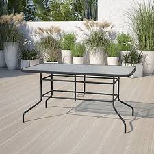 A patio table umbrella made to go through the hole of an outdoor dining table needs a secure umbrella stand, even if it's being steadied by the patio dining table itself. Fingerhut Flash Furniture Rectangular Tempered Glass Indoor Outdoor Patio Table With Umbrella Hole
