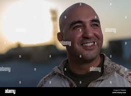 U.S. Marine Corps Sgt. Gilbert Villagrana, a trumpeter for 2nd Marine  Aircraft Wing band sings during an Independence Day concert at Havelock  City Park, North Carolina, July 3, 2021. The concert provided