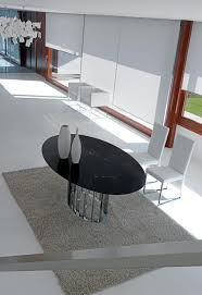 Oval marble dining tables sit right in between their round and rectangular cousins and are very modern and contemporary in comparison. Embassy Oval Marble Top Metal Dining Table Shop Online Italy Dream Design