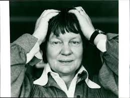Dame Iris Murdoch.