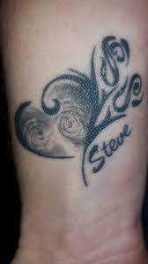 My Tattoo With Mine And Hubby S Thumbprints In The Heart Centre Thumbprint Tattoo Tattoos Fingerprint Art