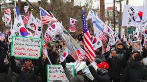 The flag of north korea, also known as the ramhongsaek konghwagukgi (korean: Seoul Police Scuffle With Protesters Burning Kim Jong Un Portraits N Korean Flags Video Rt World News