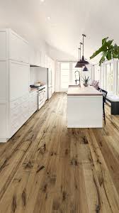 For Floors That Really Standout Distressed Brown Maple Flooring Goes Hand In Hand With This Kitc Hardwood Floors Dark Hardwood Floor Colors Wood Floor Kitchen