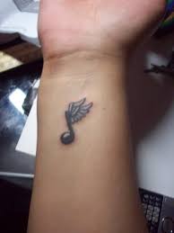 Heart and cross bracelet tattoos on wrist ideas for religious girls. 40 Beautiful Side Wrist Tattoos