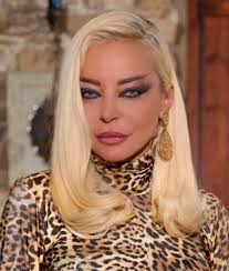 Rita Karkafi In English