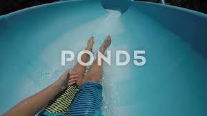 • listen to those people. Pov Shot Of Boy Going Down Waterslide Stock Video Pond5