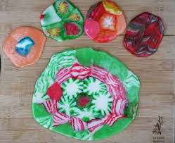 It's a super fun and inexpensive homemade christmas craft to make with the kids! Melted Christmas Candy Ornaments Cheap Recipe Blog
