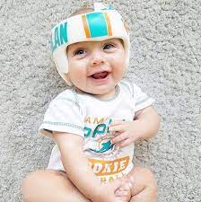 If Your Little Ones Have To Wear A Cranial Helmet There Are More Than A Few Ways To Work Their Cute Headgear Into Their Halloween Costume Cute Games Cute Baby