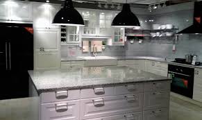 Emerald pearl granite countertops look great with both white and dark cabinets. Luna Pearl Granite