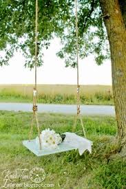 An Old Fashioned Wooden Swing Wooden Swings Wooden Tree Swing Swing