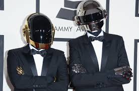 Daft punk are rarely seen without their robot helmets, but thomas bangalter was recently photographed sans costume (or shirt) on the beach; Daft Punka S Thomas Bangalter Appears At Cannes Without His Helmet Billboard Billboard