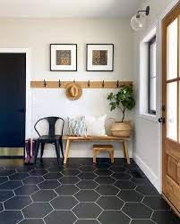The tile and especially the grout always has a white look to it and imo, it looks awful. Opal Black Hexagon Porcelain Tile In 2021 Joinery Design Floor Decor Entryway Flooring