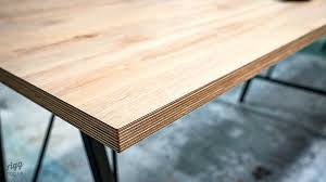 A block of wood holds the bolt for the knob. Birch Plywood Top With Oak Style Surface On Trail Long Poseur Table