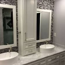 By sectioning off one long vanity into two distinct parts with the same countertop, designer vered mizrahi of very red design and the team at lux design builds maximized the usable surface space and storage while keeping things feeling cohesive. Double Bathroom Vanity Designs Ideas Locate This Pin As Well As More On Contemporary Enhancin Bathroom Vanity Designs Master Bathroom Vanity Stylish Bathroom