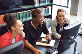 Students Working On Computer In A College Library Student Work Student Entrepreneurship Education