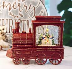 Musicbox kingdom carries one of the largest variety of music boxes in the world. Lighted Train Water Lantern With Snowmen In Swirling Glitter Snow Globe 9 25 Inch