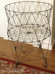Here's a rolling laundry basket that looks vintage farmhouse and holds a mountain of storage possibilities. Vintage Wire Laundry Basket