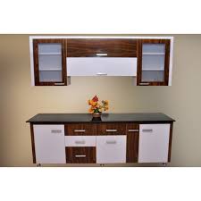 A grey and white kitchen featuring a white subway tile backsplash, ikea cabinets, hardwood floors, marble lookalike quartz. Pvc Cabinet Modular Pvc Kitchen Cabinet Manufacturer From Ahmedabad
