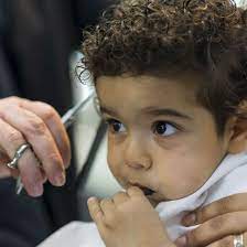 7 Tips For Surviving Your Toddler S First Haircut Today S Parent Black Baby Hairstyles First Haircut Boys First Haircut