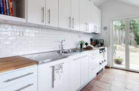 Modern kitchen backsplash ideas spaces will fall in love quickly with the versatility of metal backsplash tile. Modern White Kitchen Tile Novocom Top