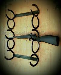 There are 10712 horseshoe home decor for sale on etsy, and they cost $34.46 on average. Rustic Horseshoe Gun Rack Western 3 Gun Rack Hunting Home Decor Aftcra