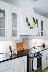 Update your kitchen with our selection of kitchen cabinets from menards. Our Kitchen Remodel Reveal Dawn P Darnell Kitchen Remodel White Cabinets White Countertops Kitchen
