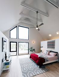 A ceiling fan over the bed symbolizes cutting energy over the bed that causes physical and emotional chaos. Photo 1 Of 825 In Bedroom Light Hardwood Photos From The New Home On The Block That Uses 90 Less Energy Dwell