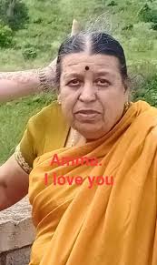 Amma You In my children's blood In their faces Glimpses of you An enfolding  of arms I wonder if they feel them Holding their hearts Mother, you Are  still here With us.