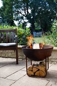 Is it safe to use a rusty fire pit. Cast Iron Fire Bowl With Stand In Rust Iron 57cm Pits Pots And Patios