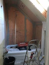 Bathroom with sloping ceiling and velux window and sink in. Tiny Attic Bathroom Gets A Diy Update Hometalk