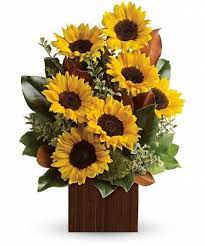 You Re Golden Bold Bright Sunflowers Are Arranged With Delicate Oregonia Magnolia Leaves Lemon Le Fall Flower Arrangements Teleflora Flowers Flower Delivery
