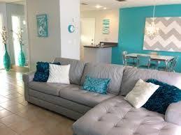 Teal blue manages to be its own color and still come in a variety of its own shades, whether they are more teal greens or more cloudy, dark teals. Turquoise Grey Gold Living Room Google Search Living Room Turquoise Teal Living Rooms Living Room Grey