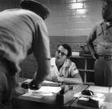 Barbara Diver, airman, Ernie Gaines PHC, in Photolab, 1959 photo