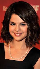 Style your short hair by creating loose waves with a big curling iron. 43 Stunning Selena Gomez Hairstyles You Need To Check Out