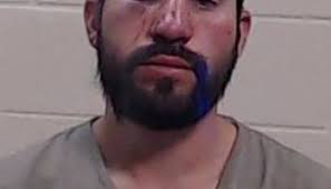 Man accused of wielding scissors during robbery