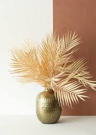 Durable plastic foliage and trees make ideal outdoor decorations, while more delicate foam or silk flowers are perfect for a small bunch of flowers to either walk down the aisle or to brighten a room in a vase. Pin By Manfred On Deko Allgemein In 2021 Palm Leaf Decor Palm Leaf Plant Dried Flowers