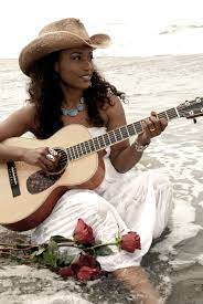 Handsome man singer and guitarist. Black Country Singers Essence