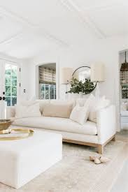 But just wait until you step inside. White Midcentury Modern Living Room Ethereal Chic Hello Lovely