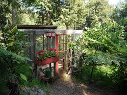 We love the stained look of the coop in the pictures above but this chicken coop can be stained or painted any color to match. Lady In Red A Woodland Chicken Coop With Charm To Spare Gardenista