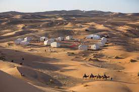 Built in 2016, on an area of 5 hectares, we are situated approximately 5metres from one of the largest dunes of the erg chebbi, where some of the dunes rise to 250meters from the surrounding hamada (rocky desert), our nearest towns are erfoud and rissani. Luxury Desert Camps Camping In Morocco S Sahara Merzouga Luxury Desert Camp Desert Tour Desert Travel Morocco Tours