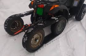 atv half track made of old snow tires