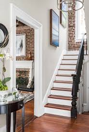 Note the colonnade between rooms, the open plan, the simple lines, and the use of unpainted wood. 58 Staircase Design Ideas Staircase Design Design Staircase